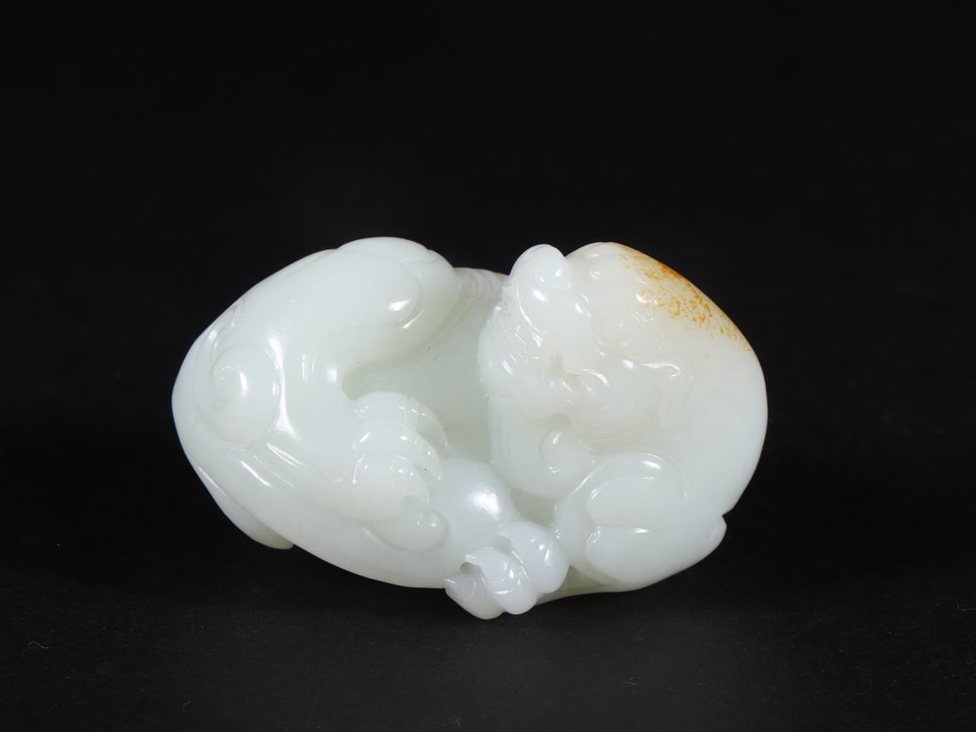 An Exquisite White Jade Auspicious Beast Hand Piece (1 of 9)
