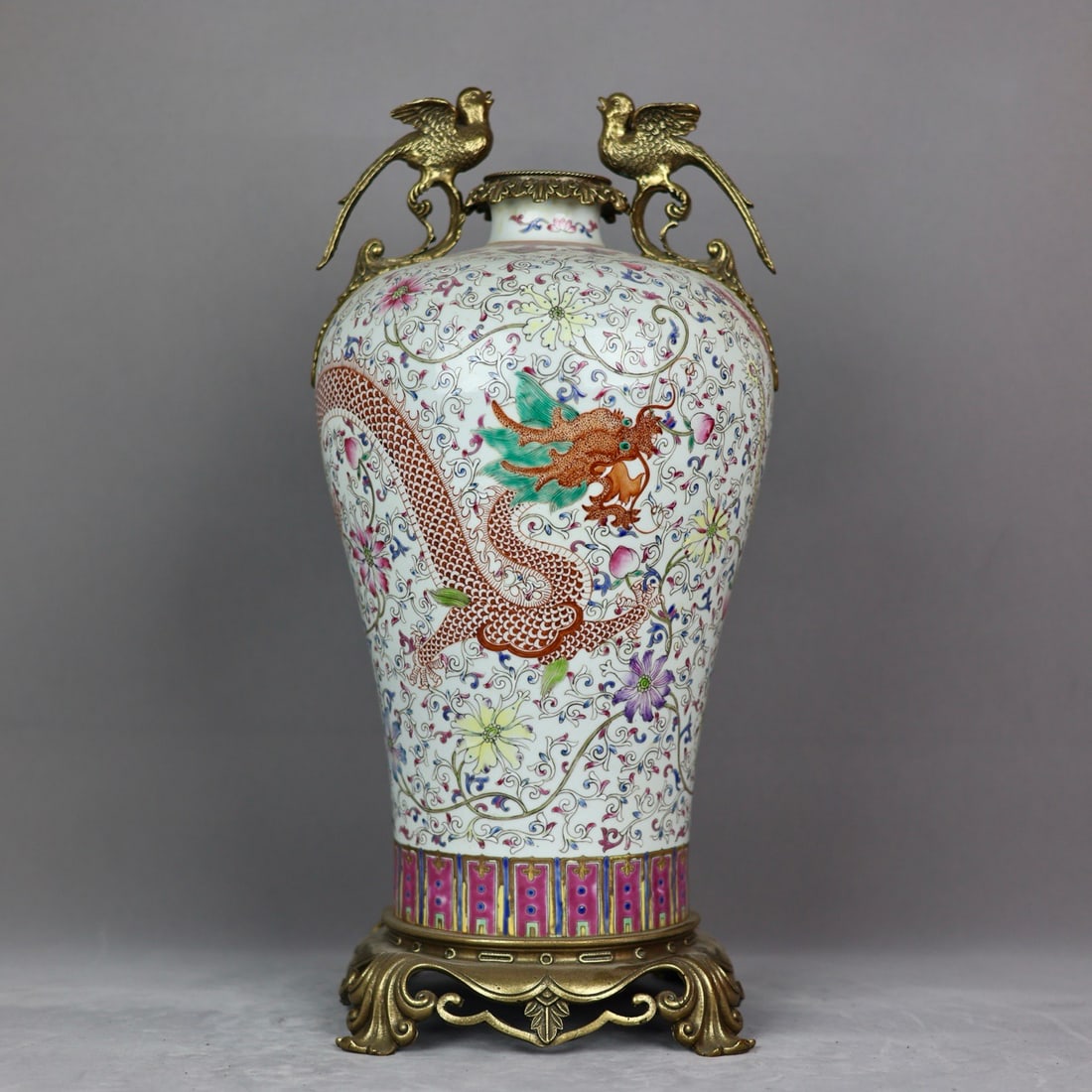 An Exquisite Famille-Rose Inlaid Bronze Dragon and Phoenix Pattern Lotus Pattern Double-Ears Vase: An Exquisite Famille-Rose Inlaid Bronze Dragon and Phoenix Pattern Lotus Pattern Double-Ears Vase Qing Dynasty, China Jiaqing Six-character Mark Size:47cmx21cm (The Dimensions Of All Batches Are