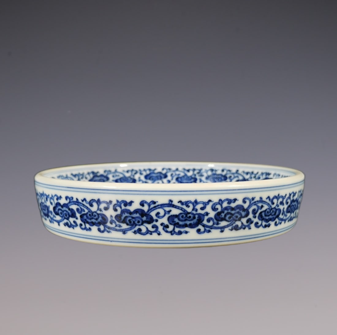 An Exquisite Blue and White Lotus Pattern Bats and Peach Pattern Plate: An Exquisite Blue and White Lotus Pattern Bats and Peach Pattern Plate Qing Dynasty, China Qianlong Six-character Mark Size:3.4cmx17.8cm (The Dimensions Of All Batches Are Manually Measured.If You