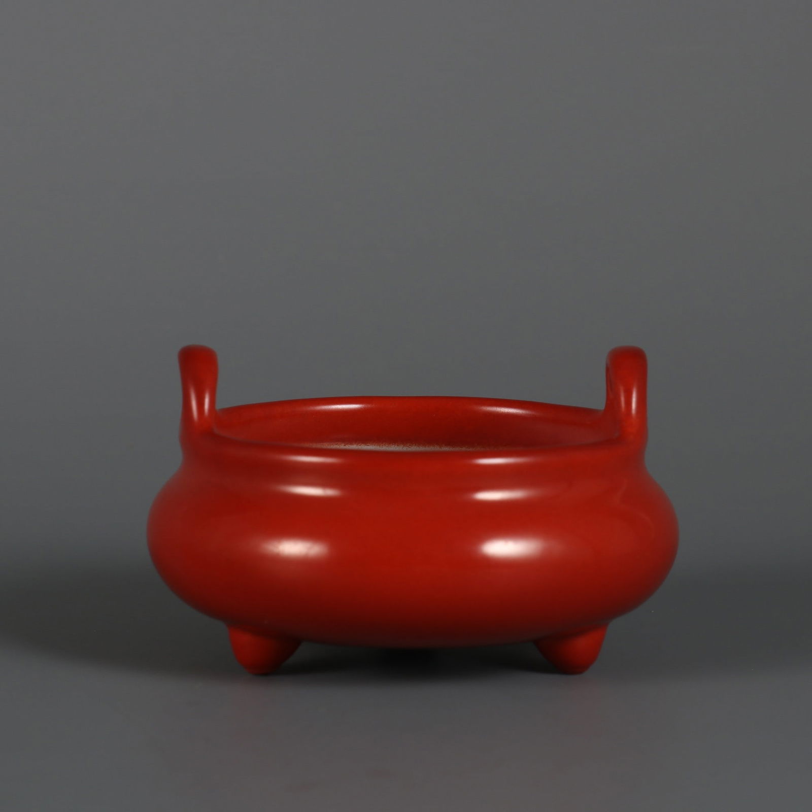 An Exquisite Coral Red Glazed Double-Ears and Tripod Censer: An Exquisite Coral Red Glazed Double-Ears and Tripod Censer Qing Dynasty, China Yongzheng Four-character Mark Size:4.8cmx8.4cm (The Dimensions Of All Batches Are Manually Measured.If You Need More