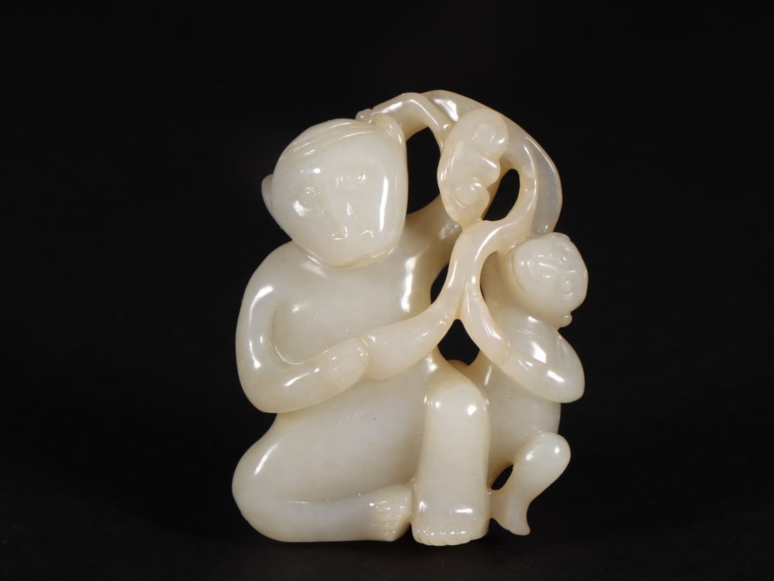 An Exquisite White Jade Monkey Ornament (1 of 9)