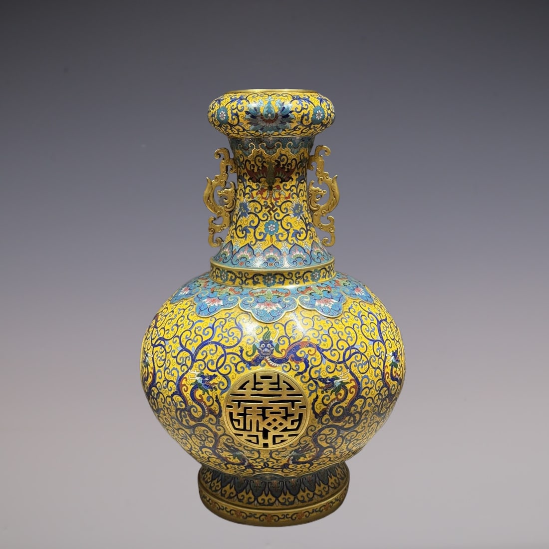 An Exquisite Cloisonne Lotus Pattern Dragon Pattern Double-Ears Vase: An Exquisite Cloisonne Lotus Pattern Dragon Pattern Double-Ears Vase Qing Dynasty, China Qianlong Six-character Mark Size:50cmx32cm Weight:10.4kg (The Dimensions Of All Batches Are Manually Measured.I