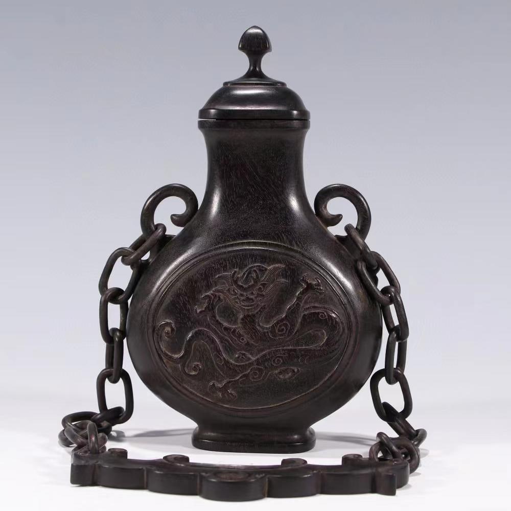 A Qing Dynasty small-leaved rosewood with a chain appreciation bottle: Qing Dynasty small-leaved rosewood with chain appreciation bottle SIZE:H:18.5cmW:11cmW:365g (The Dimensions Of All Batches Are Manually Measured.If You Need More Detailed