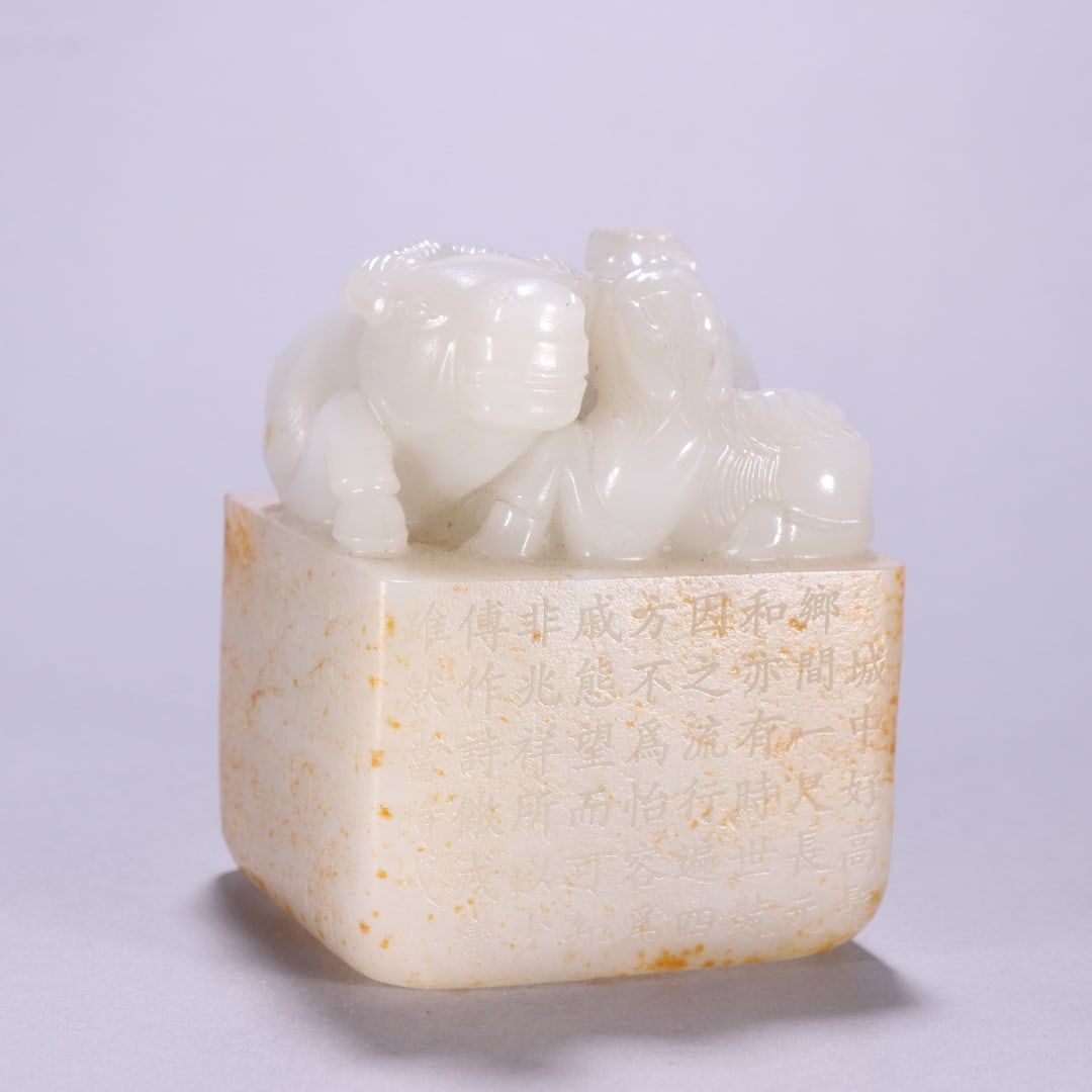 A Qing Dynasty Hetian jade seed material cow button seal: Qing Dynasty Hetian jade seed material cow button seal Size:H:8cmW:6.5cmW:746.9g (The Dimensions Of All Batches Are Manually Measured.If You Need More Detailed Information, Please