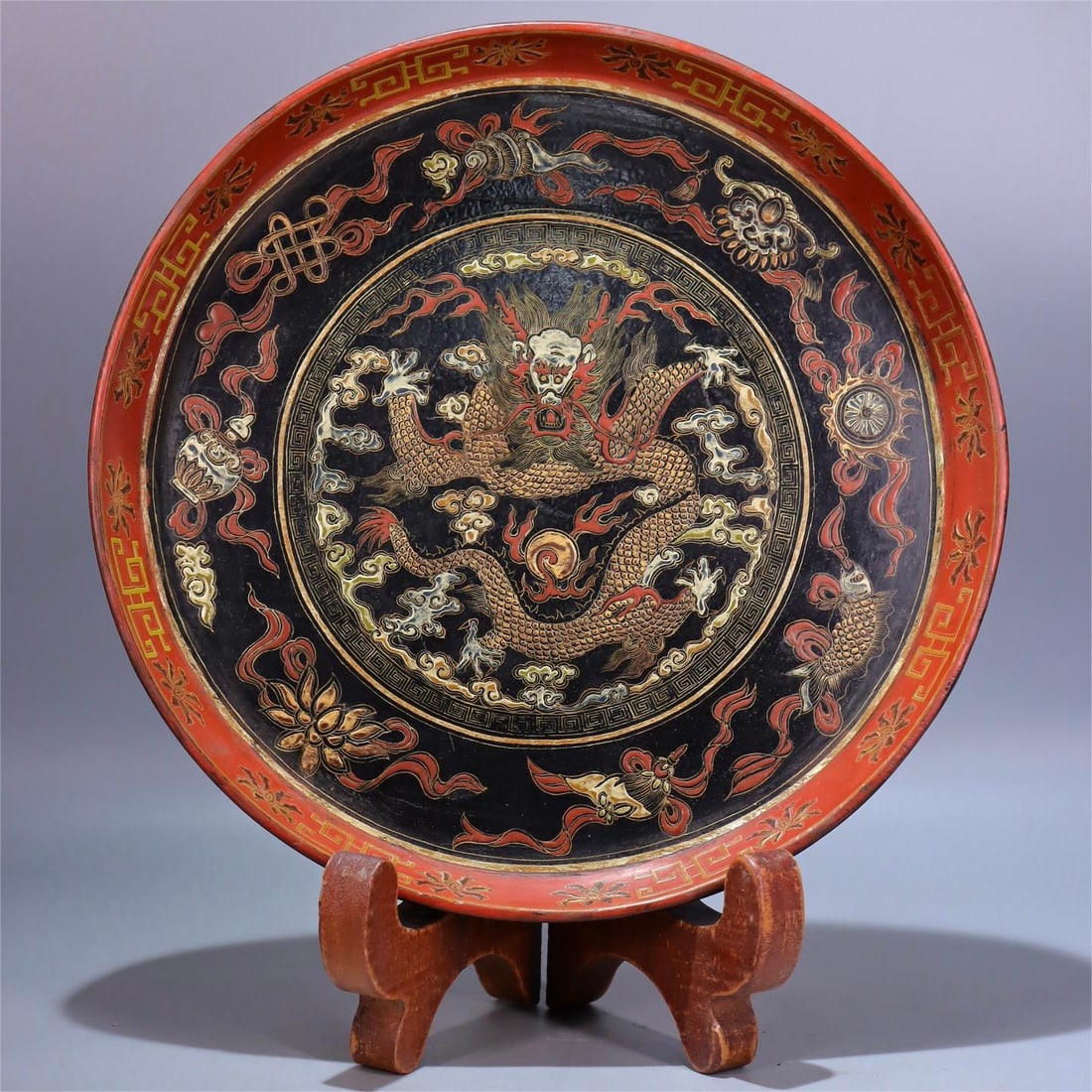 A wooden lacquer gold-painted dragon pattern eight treasure plate made in the Qing Dynasty Guangxu (1 of 9)