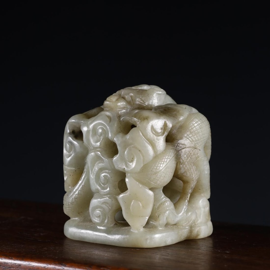 A beautiful Hetian jade carved cloud dragon pattern hat top: Exquisite Hetian jade carved cloud dragon pattern hat top SIZE:3.7cmH:4.5cmW:89g (The Dimensions Of All Batches Are Manually Measured.If You Need More Detailed Information, Please