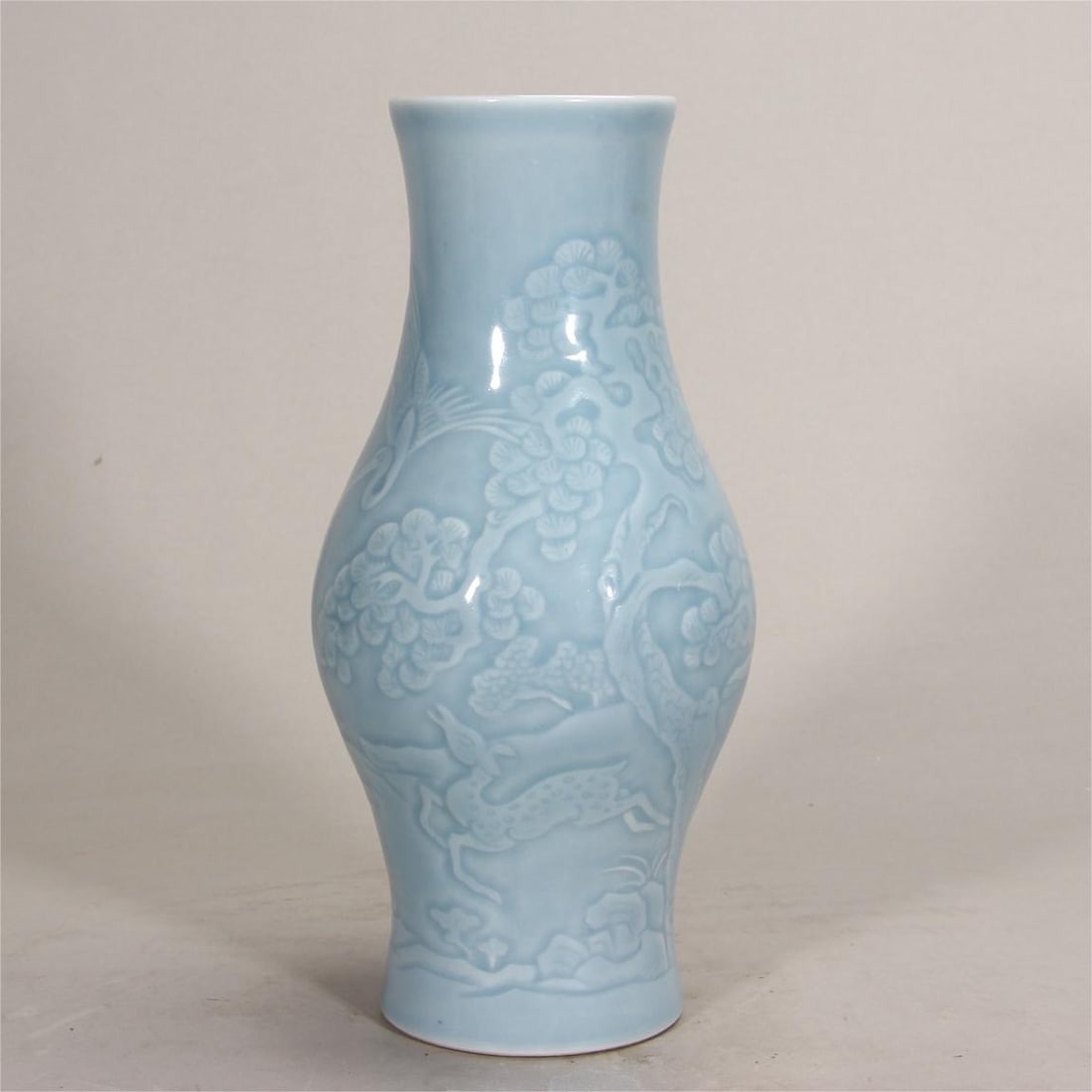 A sky blue glaze carved deer crane and spring olive bottle made in the Kangxi Dynasty of the Qing (1 of 11)
