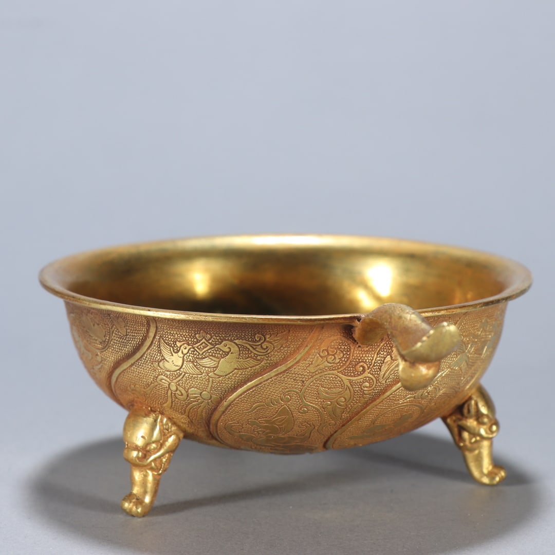 A fine copper-gilt tripod - 3