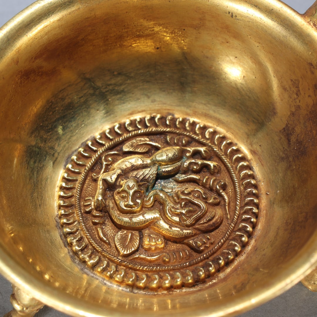 A fine copper-gilt tripod - 8