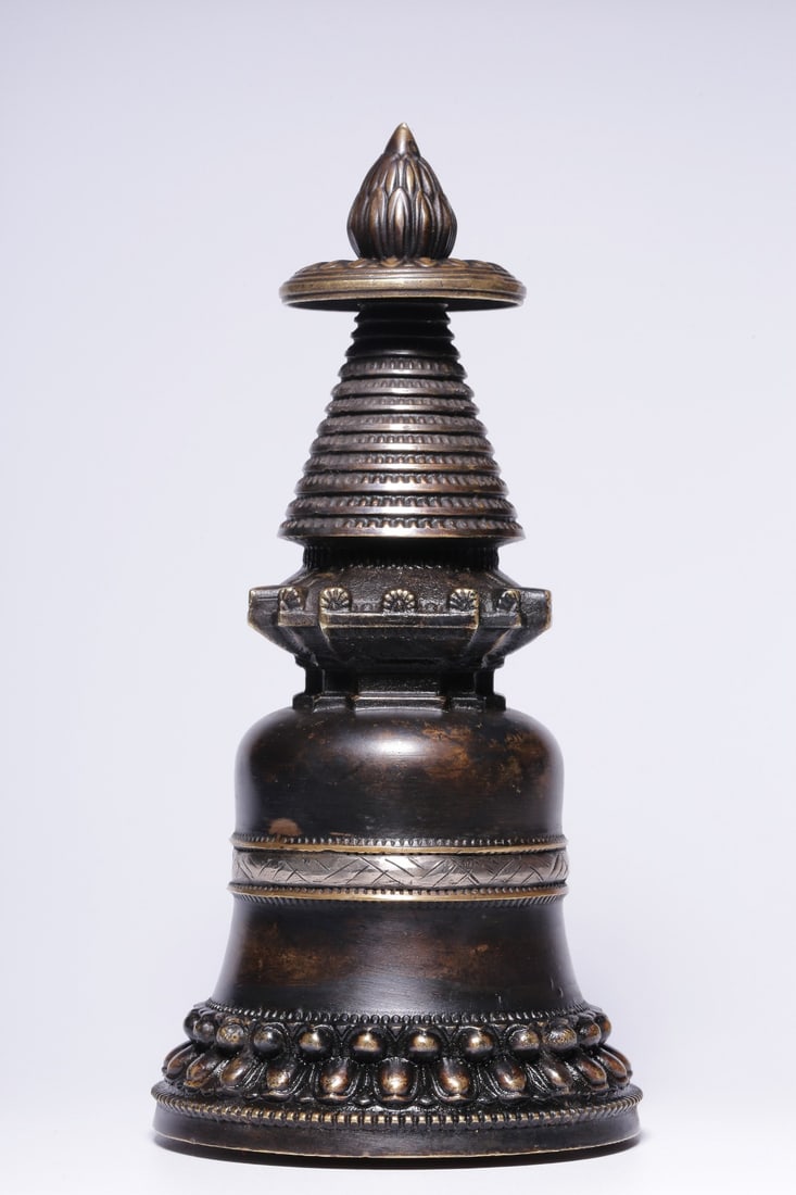 A Qing Dynasty alloy copper and silver kadang pagoda: Qing Dynasty alloy copper wrong silver kadang pagoda Size:H:16.5cmD:7.5cmW:483g (The Dimensions Of All Batches Are Manually Measured.If You Need More Detailed Information, Please
