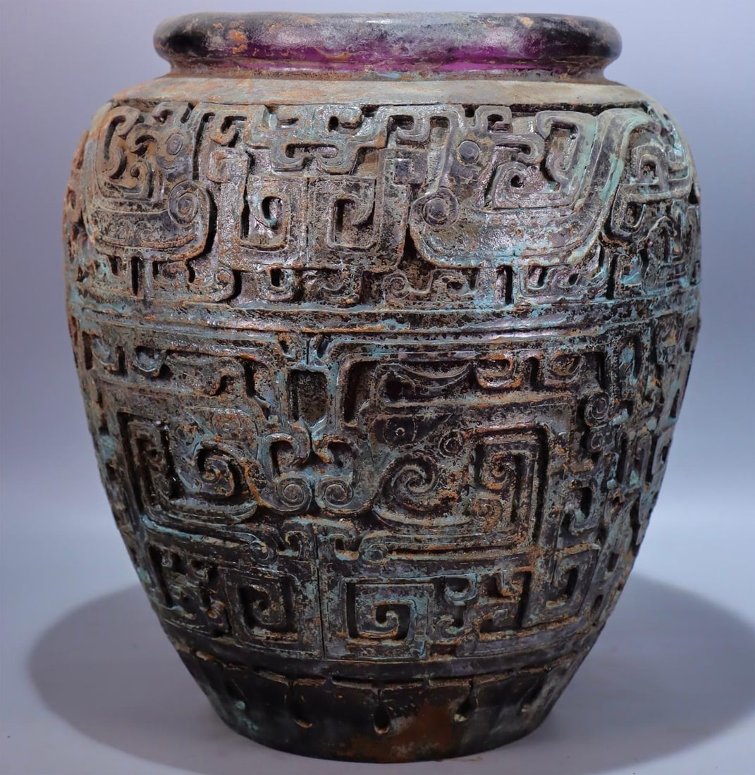 A beautiful purple glazed carved large jar (1 of 9)