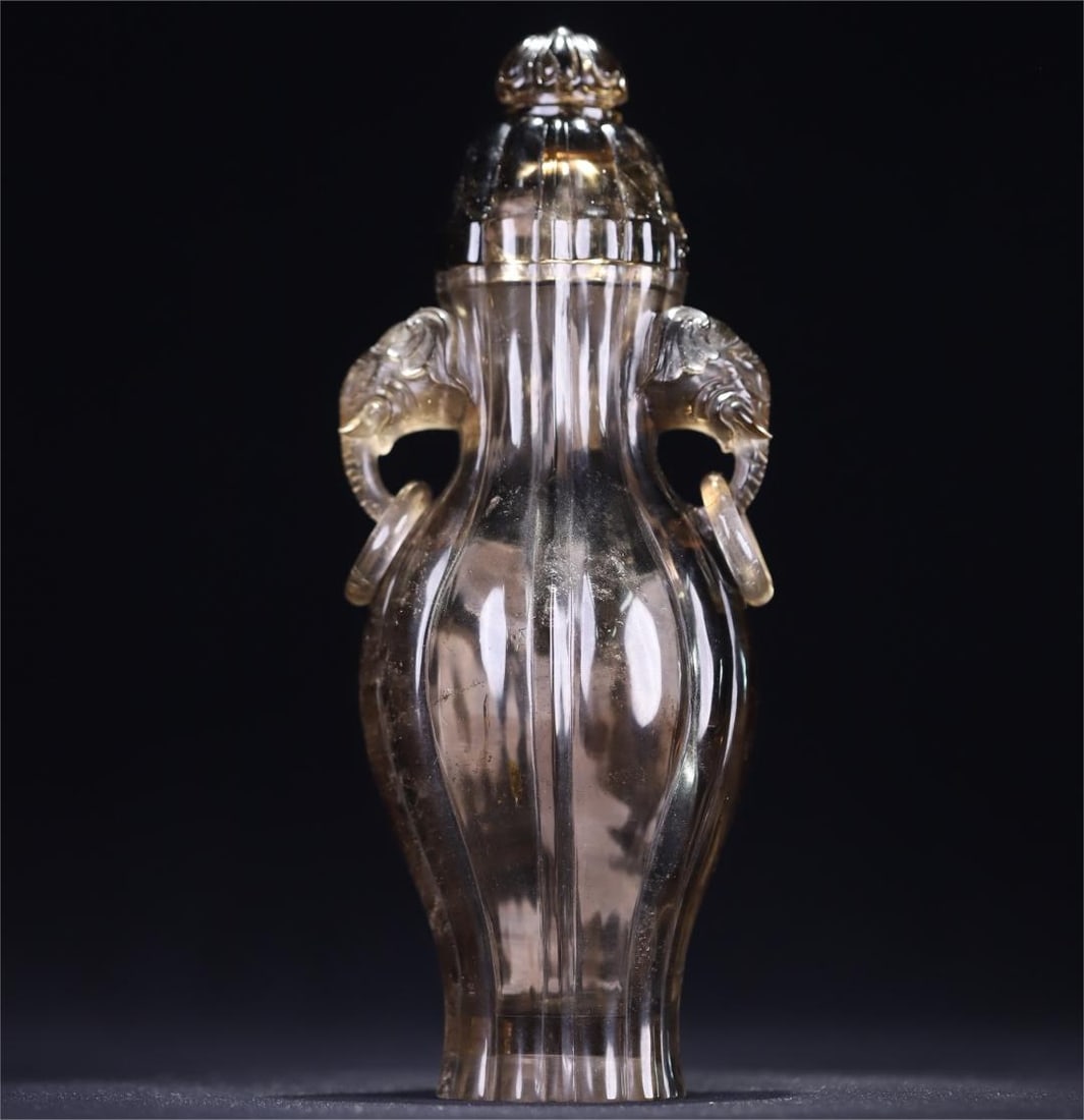 A Qing Dynasty tea crystal elephant earring lid bottle (1 of 10)