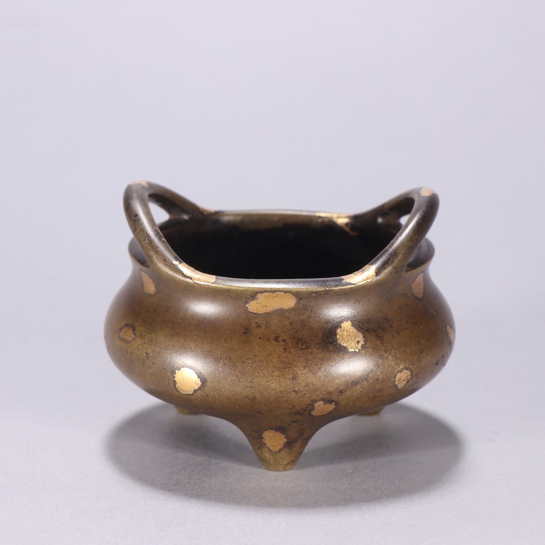 A copper-dotted three-legged incense burner from the Ming Dynasty (1 of 9)
