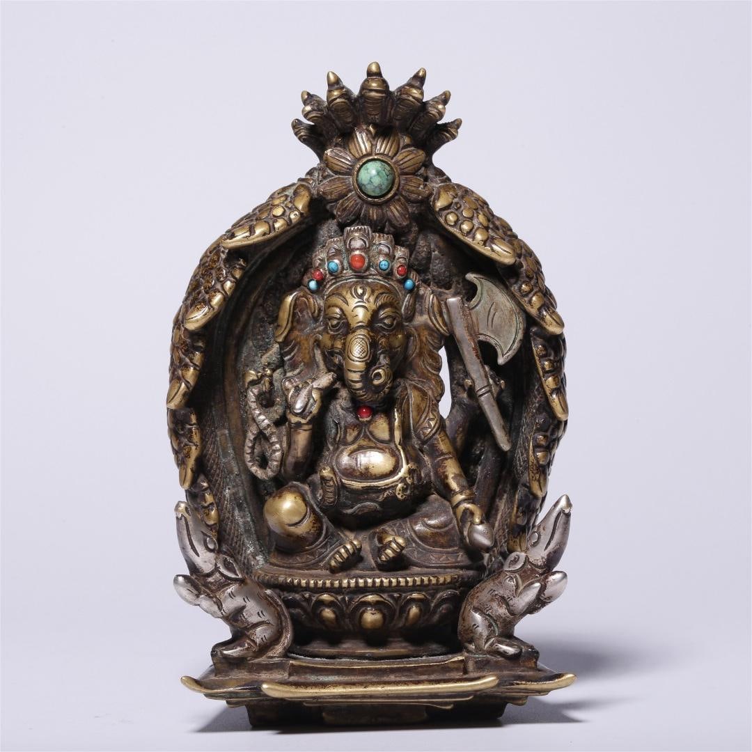 A bronze inlaid turquoise elephant trunk statue of the God of Wealth in the Qing Dynasty (1 of 10)