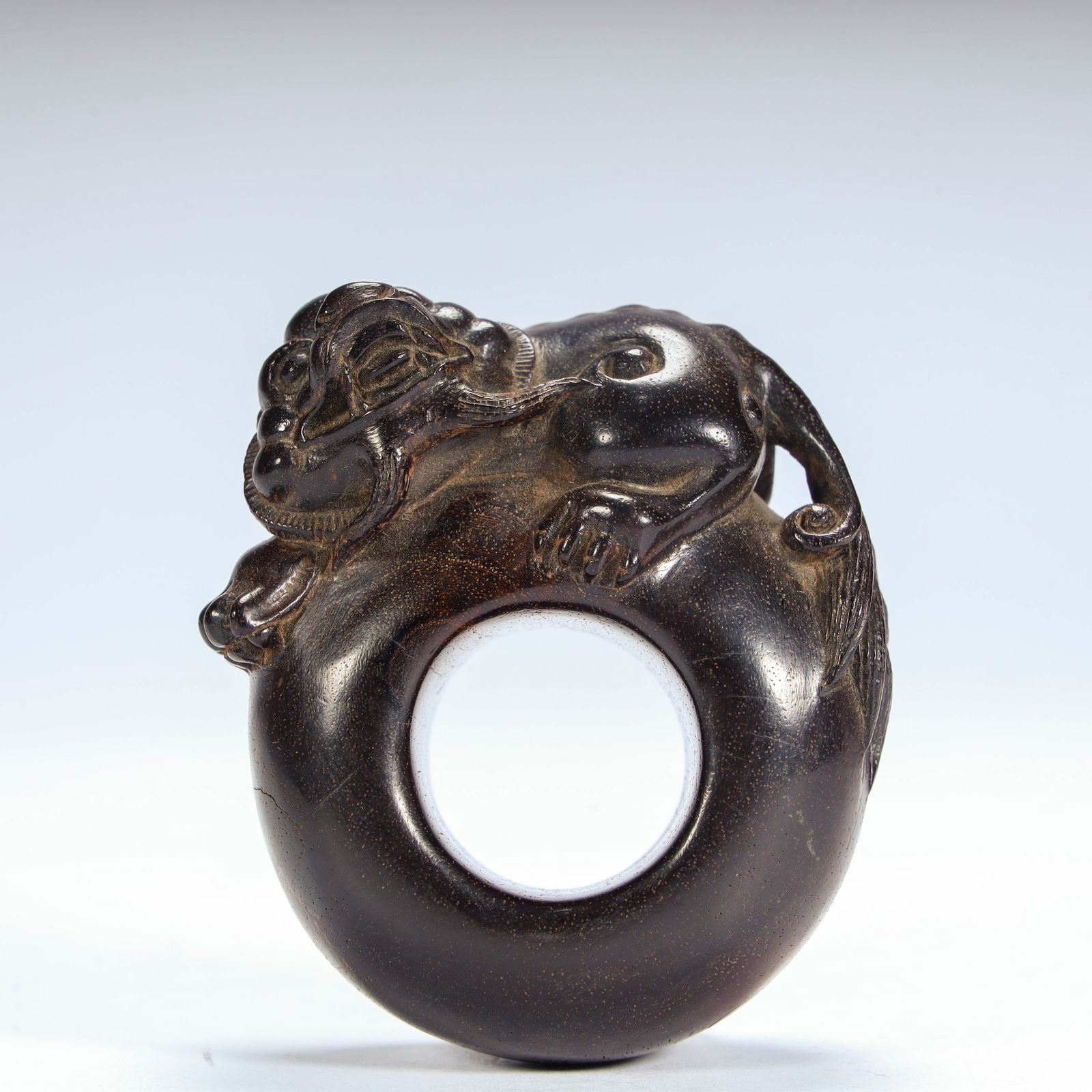 A Qing Dynasty rosewood carved dragon pattern finger: Qing Dynasty rosewood carved dragon pattern finger Size:H:3.5cmL:6.5cmW:6cmW:65g (The Dimensions Of All Batches Are Manually Measured.If You Need More Detailed Information, Please Contact Our Customer