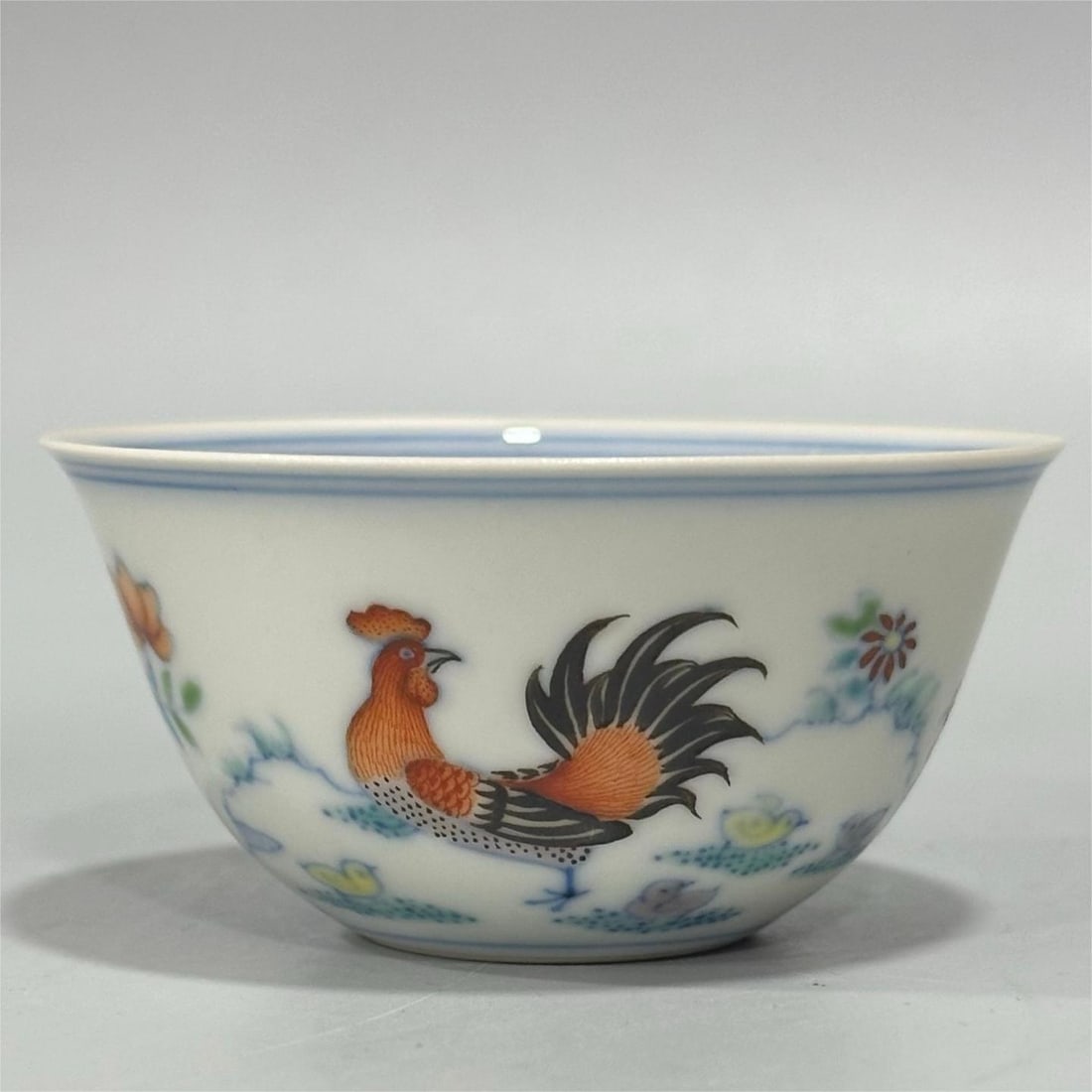 A Doucai chicken tank cup made in the Yongzheng era of the Qing Dynasty (1 of 7)