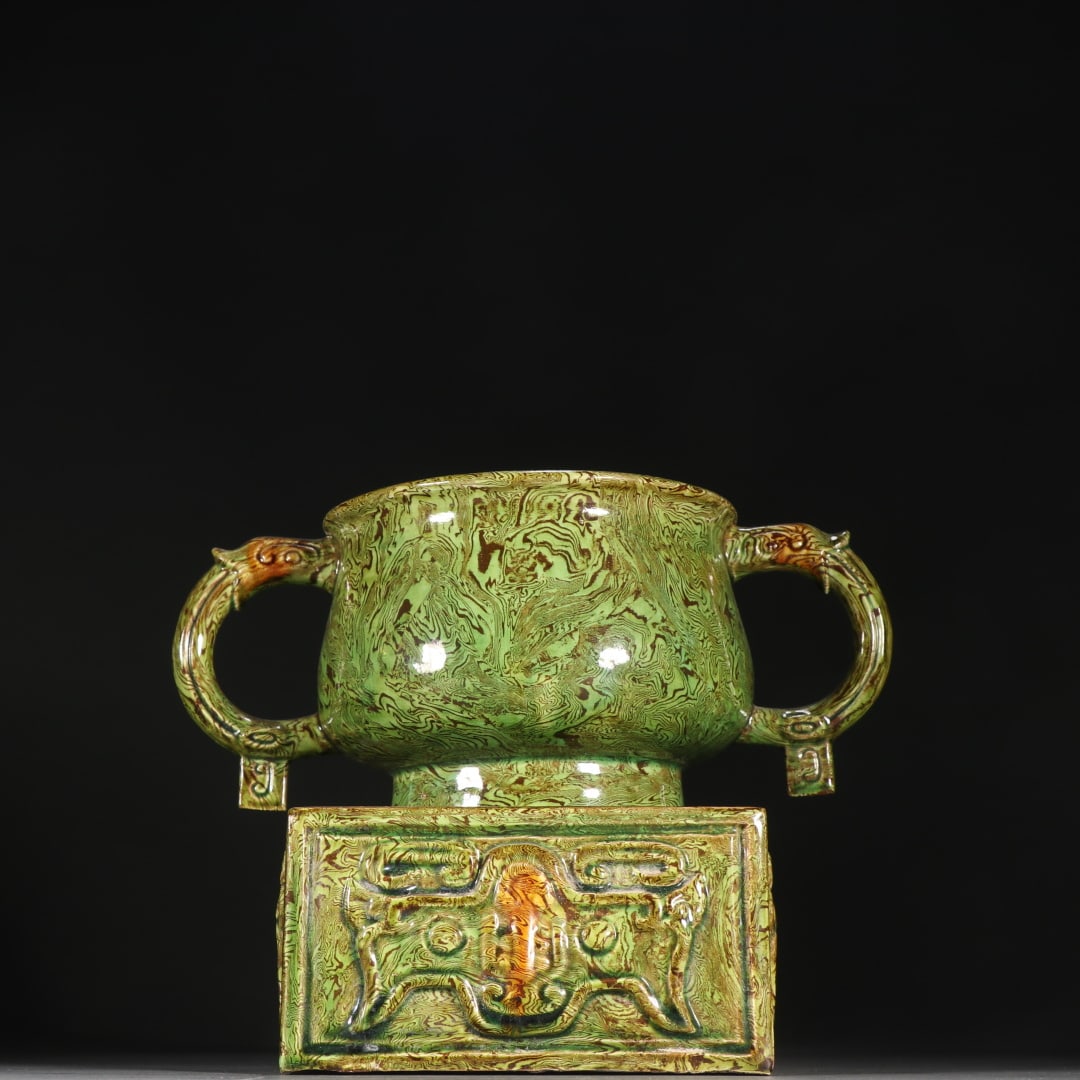 A twisted tire green glazed dragon ear round vessel of the Gongxian kiln in the Tang Dynasty (1 of 9)