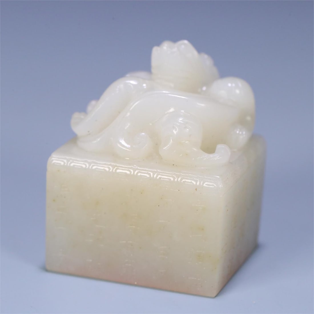 A Qing Dynasty Hetian jade dragon button poetry seal (1 of 9)