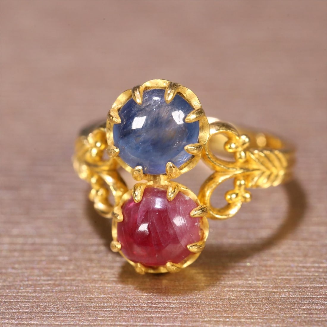 A fine ruby and sapphire ring set in solid gold (1 of 2)
