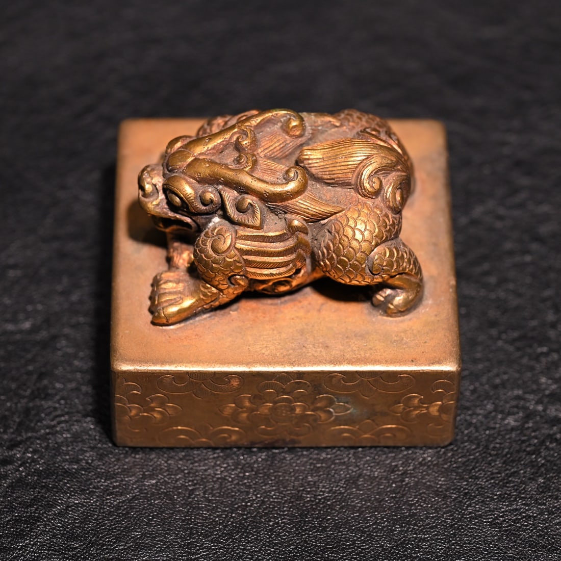 A fine copper gilt beast button seal - 3