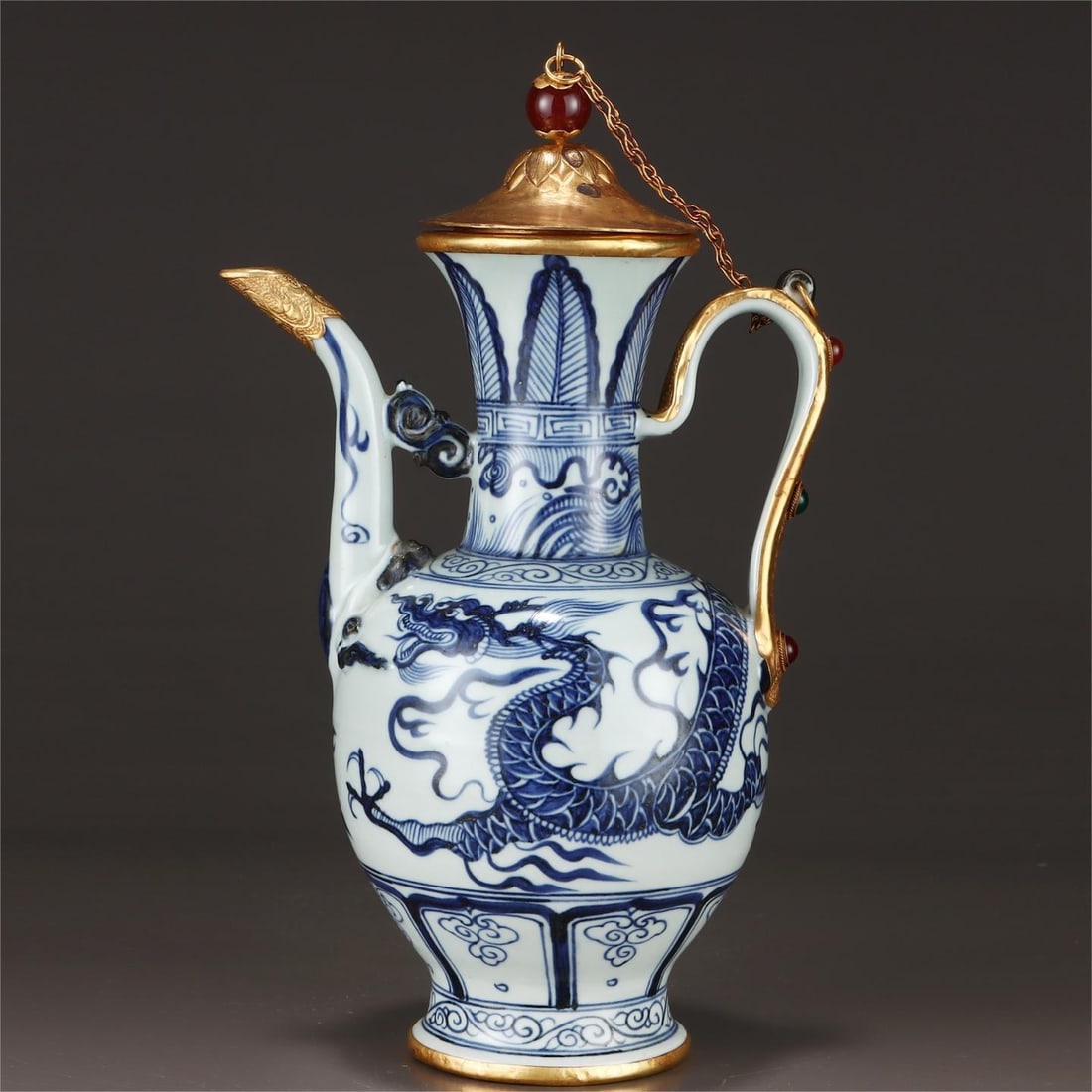 A Yuan Dynasty blue and white dragon pattern inlaid with gold chisel and inlaid gemstone pot: The blue and white dragon pattern of the Yuan Dynasty is inlaid with gold and inlaid with gemstones Size:H:28cmW:17.2cm (The Dimensions Of All Batches Are Manually Measured.If You