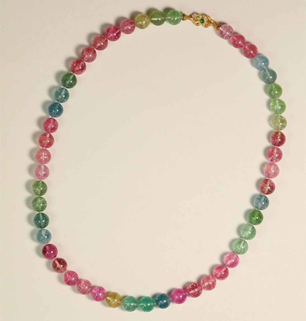 A fine rainbow tourmaline long chain with 18K yellow gold set with diamonds and a green jade clasp: Exquisite rainbow tourmaline long chain with 18K yellow gold set with diamonds and green jade clasp Size:D:1.1cmL:28cm (The Dimensions Of All Batches Are Manually Measured.If You Need More Detailed In