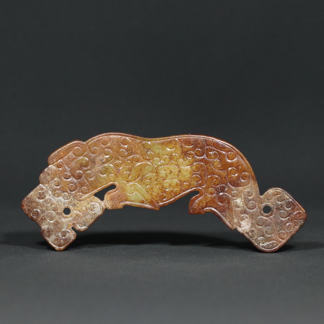 An Exquisite White Jade Tiger-Shaped Ornament: An Exquisite White Jade Tiger-Shaped Ornament Han Dynasty, China Size:12.4cmx5.2cmx0.5cm Weight:50g (The Dimensions Of All Batches Are Manually Measured.If You Need More Detailed Information, Please C