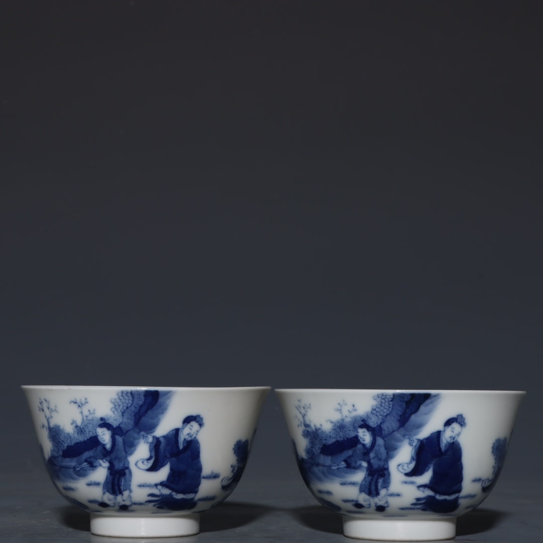 A Pair of Exquisite Blue and White Character and Story Pattern Cup: A Pair of Exquisite Blue and White Character and Story Pattern Cup Qing Dynasty, China Kangxi Six-character Mark Size:5.5cmx9.4cm (The Dimensions Of All Batches Are Manually Measured.If You Need