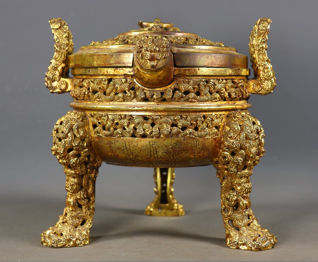An Exquisite Gilt Bronze Beast-Face Pattern With Inscription Double-Ears Tripod Censer (1 of 9)