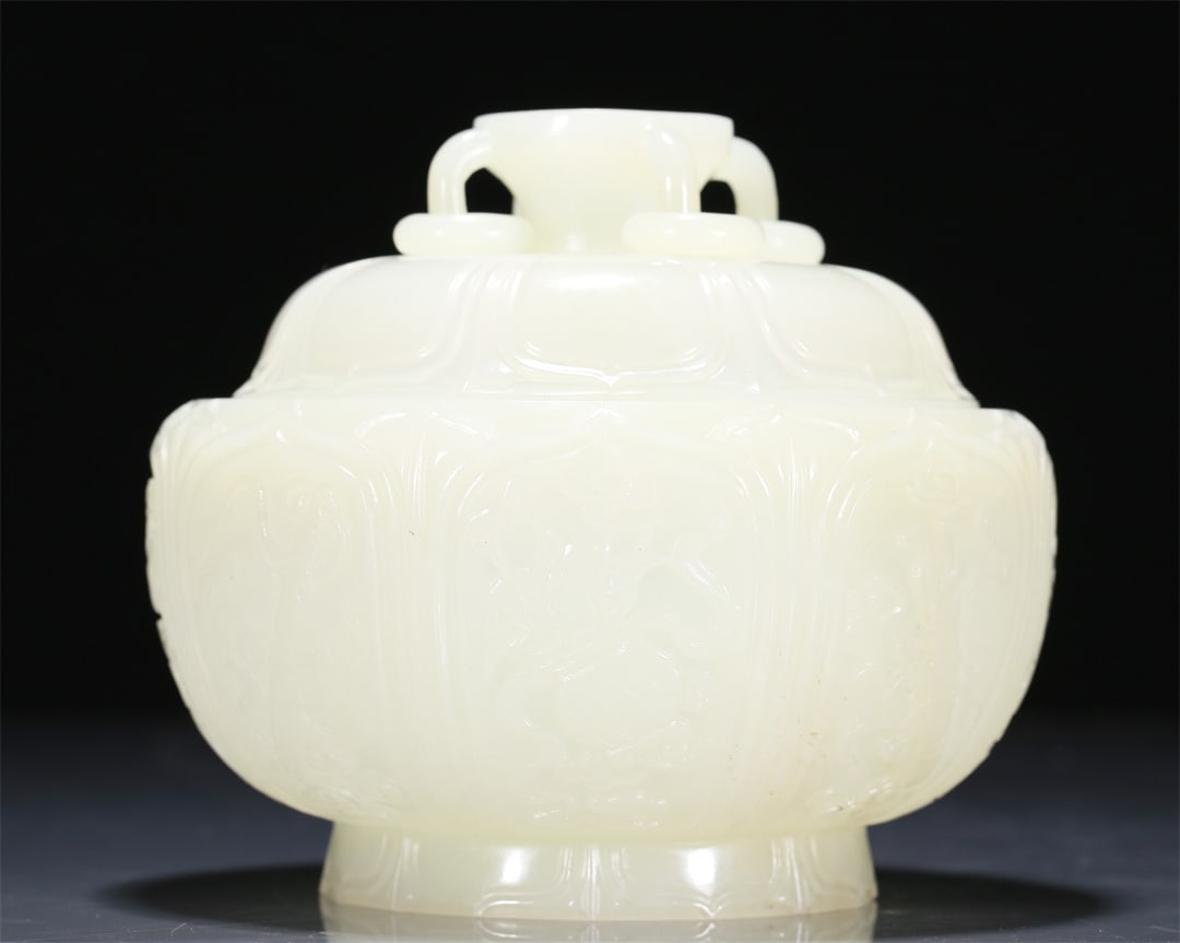 An Exquisite White Jade 'Weapons Of The Eight Immortals' Jar And Cover (1 of 7)