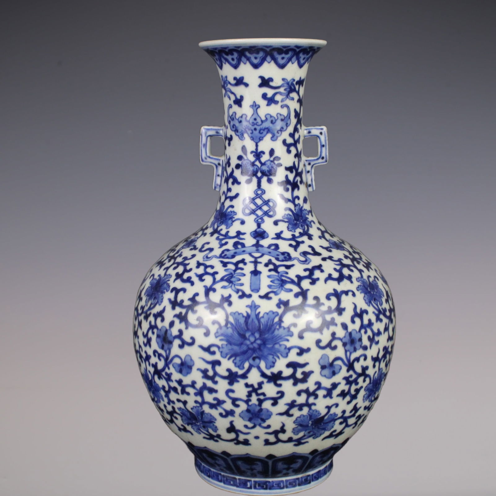 An Exquisite Blue and White Bats and Peach Pattern Lotus Pattern Double-Ears Vase: An Exquisite Blue and White Bats and Peach Pattern Lotus Pattern Double-Ears Vase Qing Dynasty, China Jiaqing Six-character Mark Size:29cmx9.5cm (The Dimensions Of All Batches Are Manually