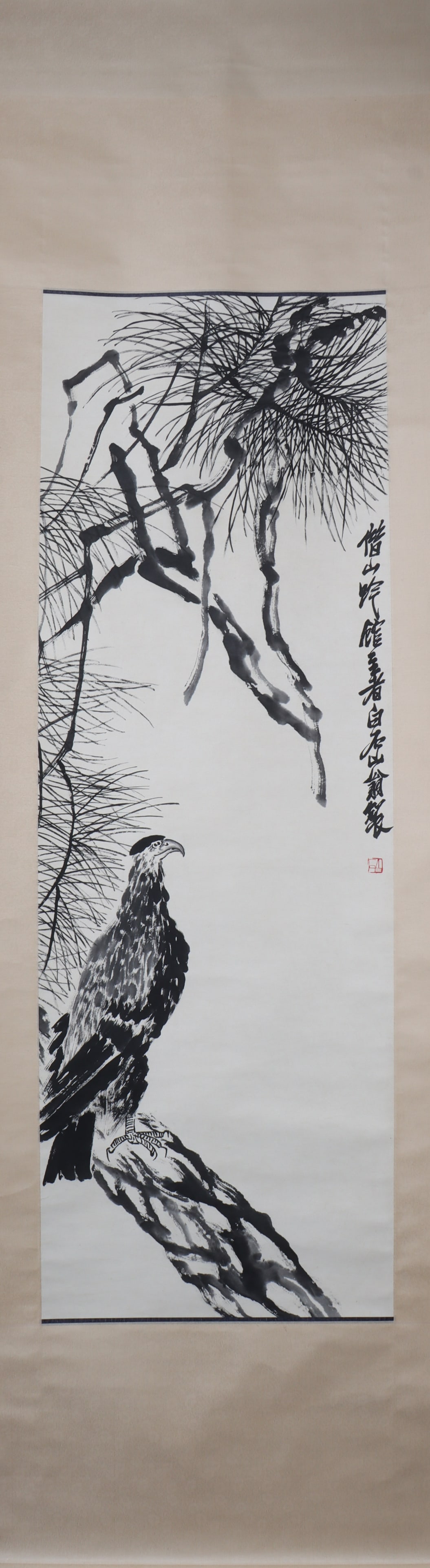 A Chinese Vertical Scroll Ink Painting of Eagle on Paper: A Chinese Vertical Scroll Ink Painting of Eagle on Paper Qi baishi Size:130cmx44cm (The Dimensions Of All Batches Are Manually Measured.If You Need More Detailed Information, Please Contact Our
