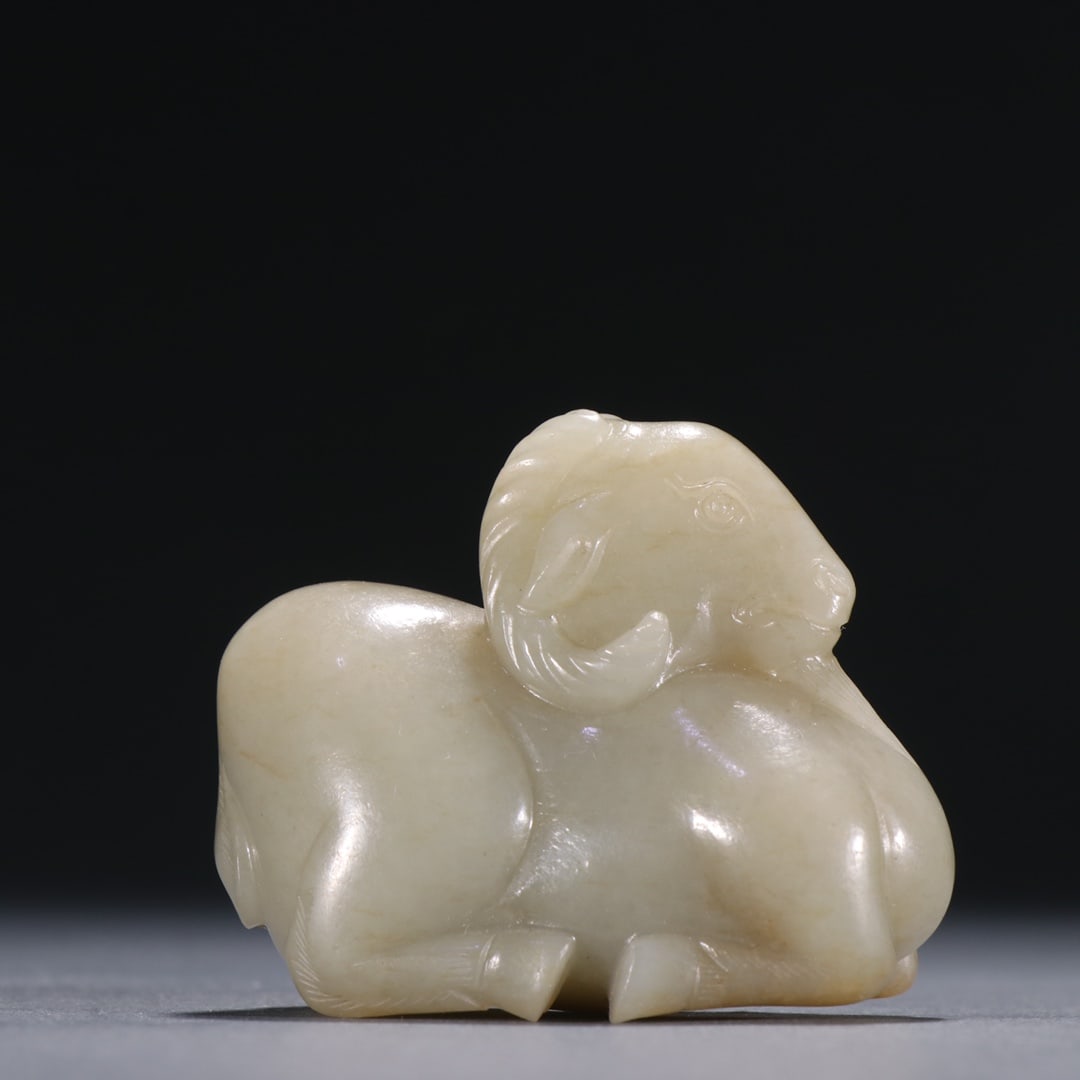 An Exquisite White Jade Sheep Ornament (1 of 9)