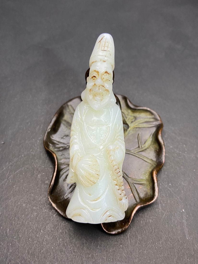 An Exquisite White Jade Figure Ornament: An Exquisite White Jade Figure Ornament Ming Dynasty, China Size:72mmx26mmx18.6mm Weight:40g (The Dimensions Of All Batches Are Manually Measured.If You Need More Detailed Information, Please