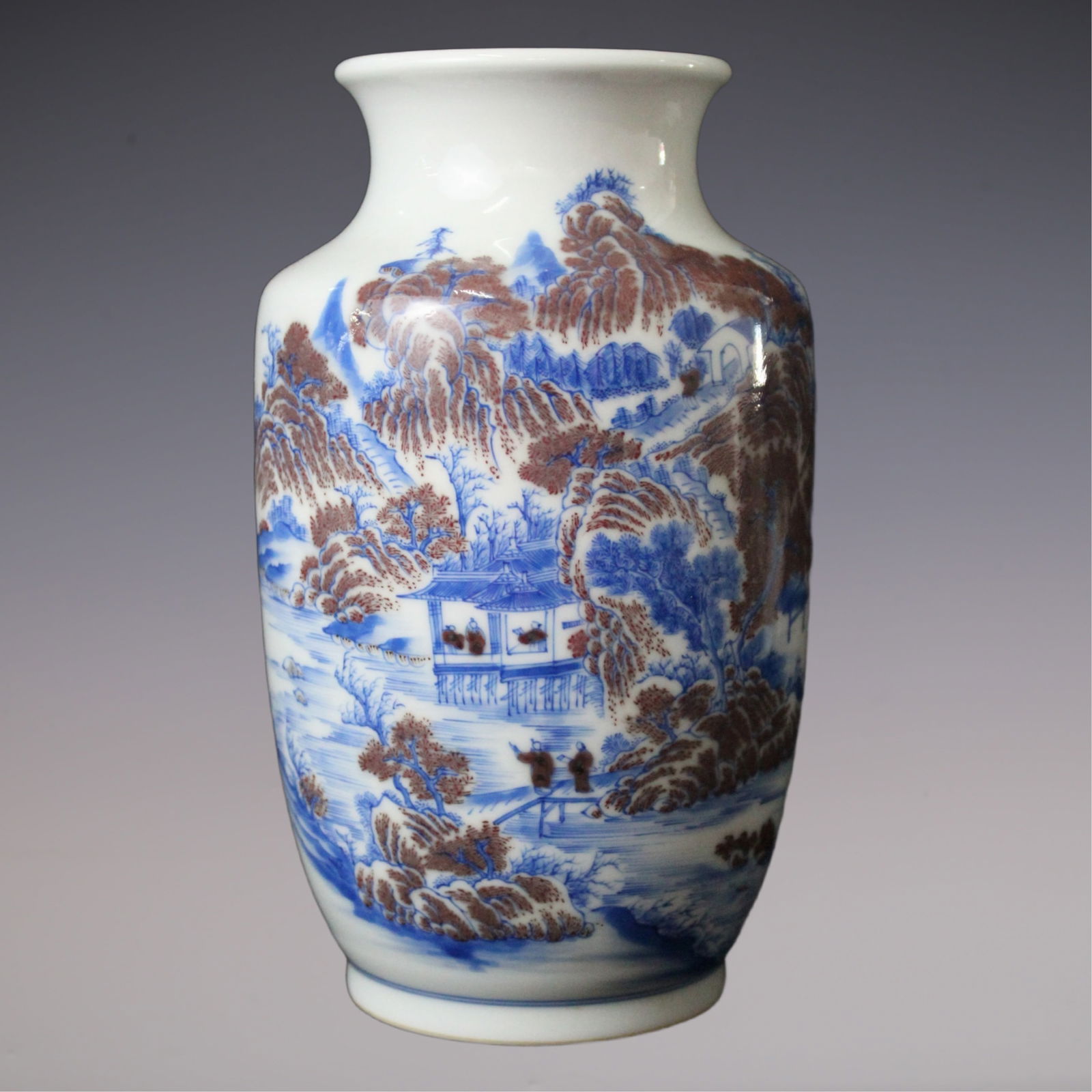 An Exquisite Blue and White Underglaze-Red Landscape and Figure Pattern Vase: An Exquisite Blue and White Underglaze-Red Landscape and Figure Pattern Vase Qing Dynasty, China Size:17.5cmx7cm (The Dimensions Of All Batches Are Manually Measured.If You Need More Detailed