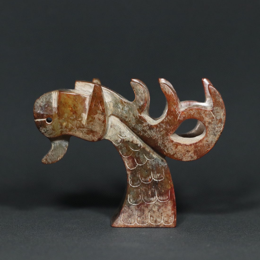 An Exquisite White Jade Ornament: An Exquisite White Jade Ornament Han Dynasty, China Size:8.8cmx3.9cmx6.7cm Weight:158.9g (The Dimensions Of All Batches Are Manually Measured.If You Need More Detailed Information, Please Contact Our