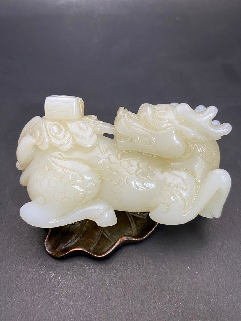 An Exquisite White Jade Kylin Hand Piece (1 of 9)