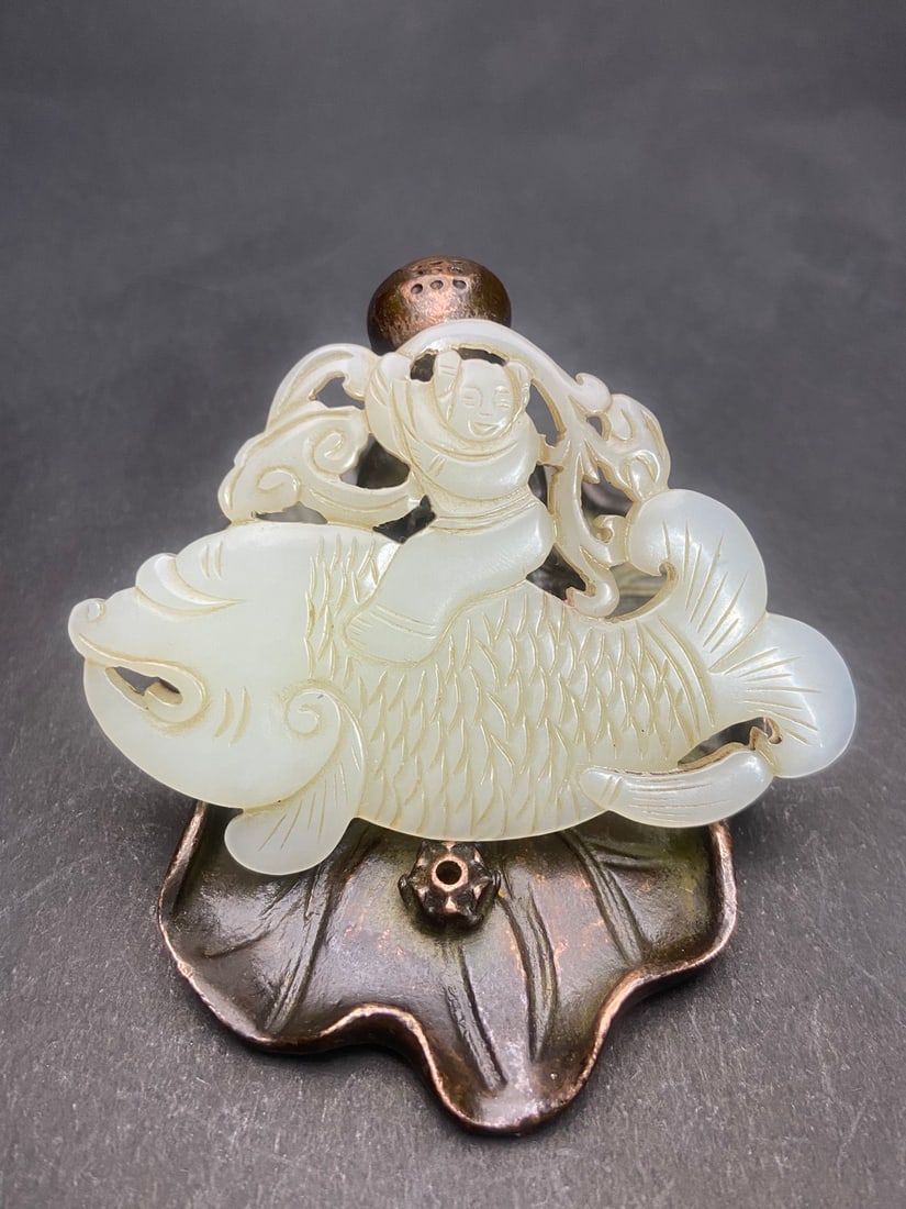 An Exquisite White Jade Fish Pendant (1 of 9)