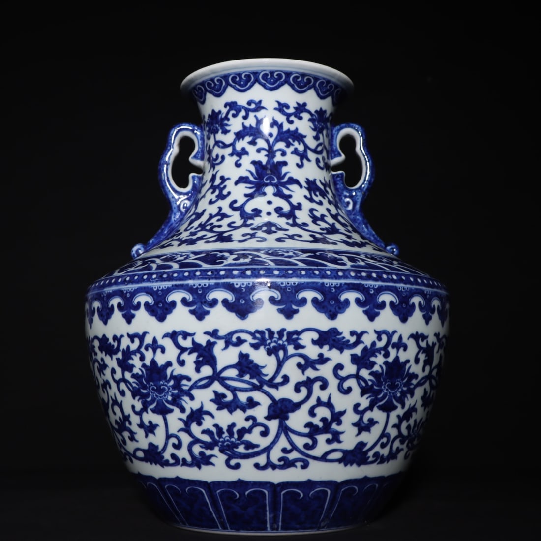 An Exquisite Blue and White Lotus Pattern Double-Ears Vase: An Exquisite Blue and White Lotus Pattern Double-Ears Vase Qing Dynasty, China Qianlong Six-character Mark Size:29cmx25cm (The Dimensions Of All Batches Are Manually Measured.If You Need More