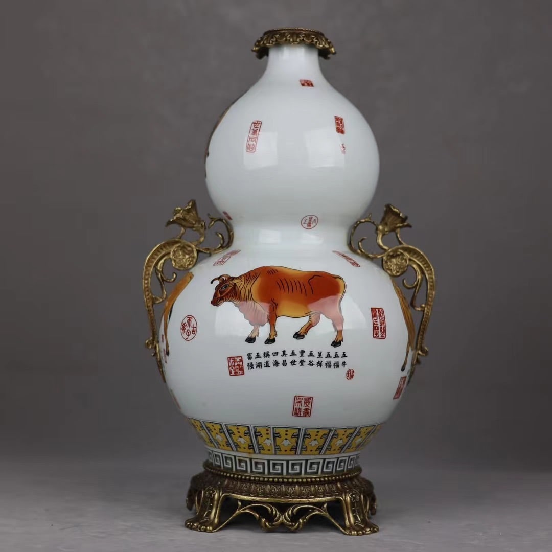 An Exquisite Famille-Rose Inlaid Bronze Buffalo Pattern Gourd-Shaped Double-Ears Vase: An Exquisite Famille-Rose Inlaid Bronze Buffalo Pattern Gourd-Shaped Double-Ears Vase Qing Dynasty, China Yongzheng Four-character Mark Size:43.5cmx23cm (The Dimensions Of All Batches Are Manually