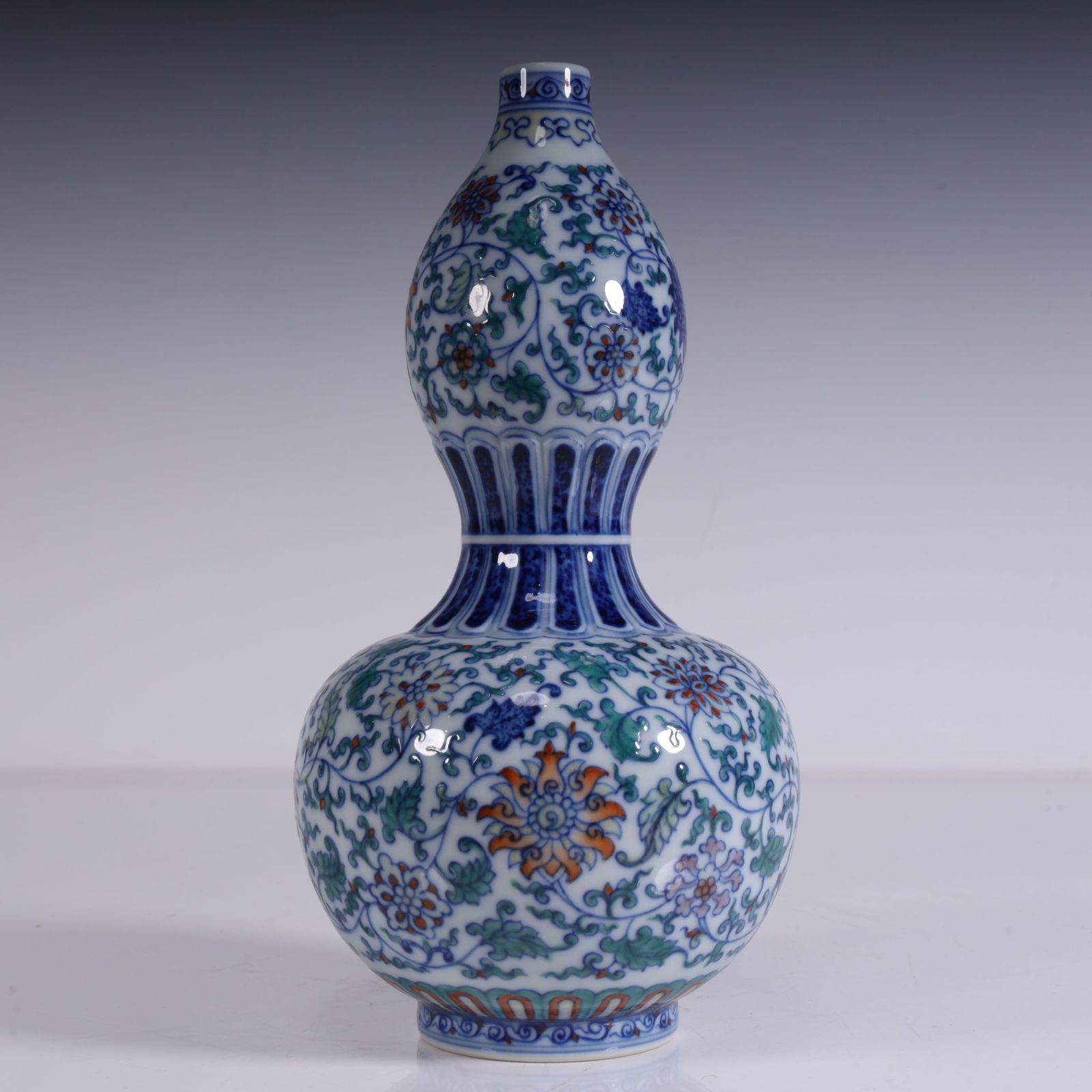 A beautiful blue and white Doucai entwined floral gourd bottle (1 of 14)