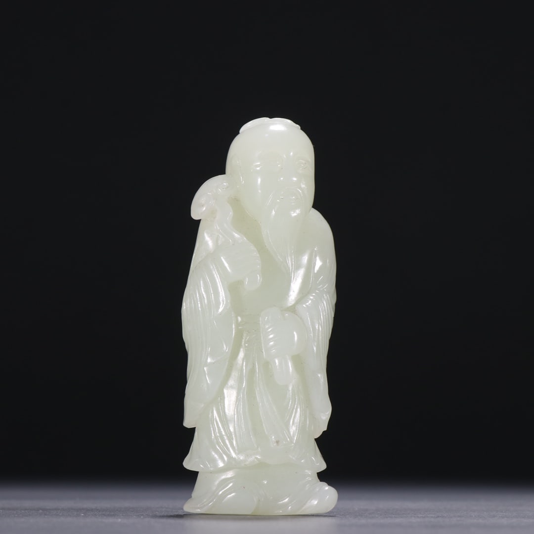 A carving of Hetian jade figures from the Qing Dynasty (1 of 9)