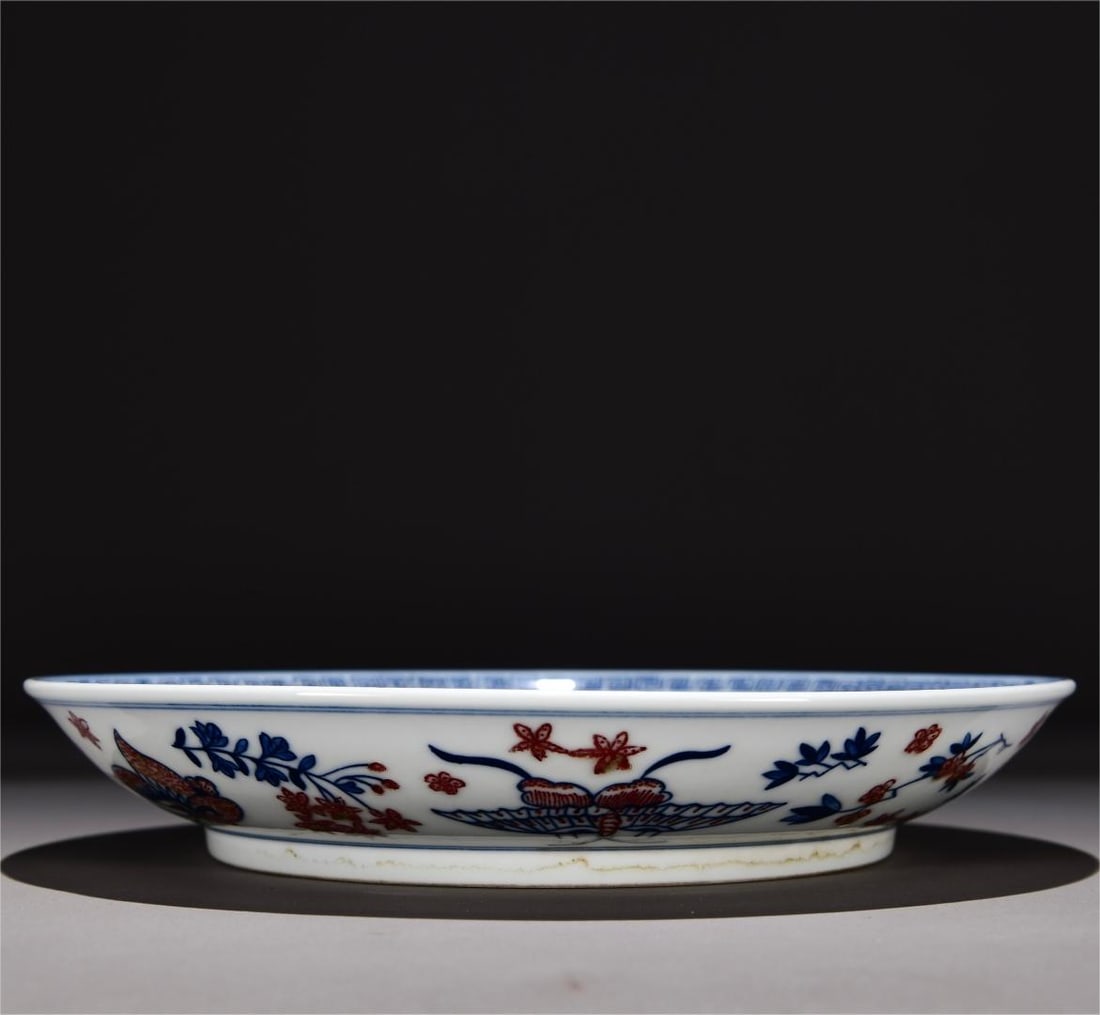 A blue and white glaze red butterfly plate made in the Yongzheng era of the Qing Dynasty: Qing Dynasty Yongzheng year blue and white glaze red butterfly diagram Size:H:4cm W:23cm (The Dimensions Of All Batches Are Manually Measured.If You Need More Detailed Information,