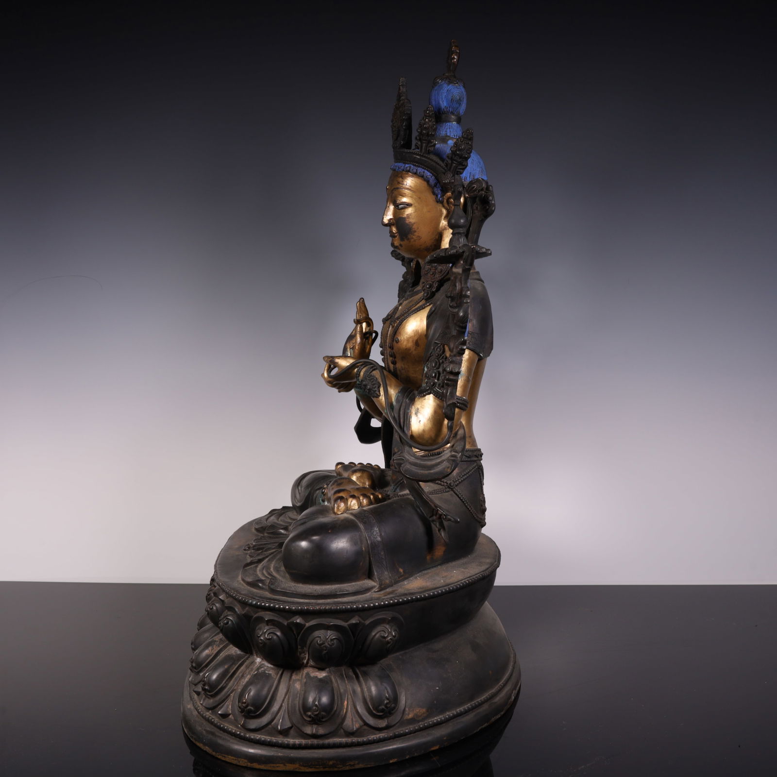 A fine copper-gilt green Tara - 12