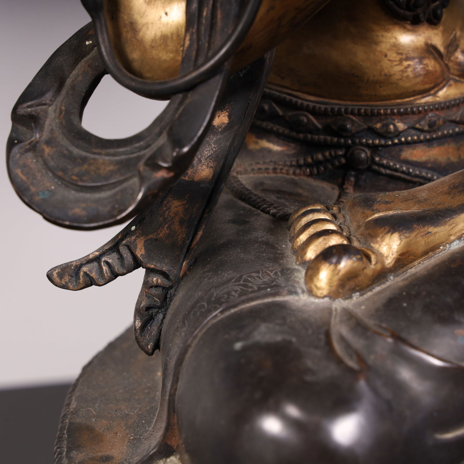 A fine copper-gilt green Tara - 18