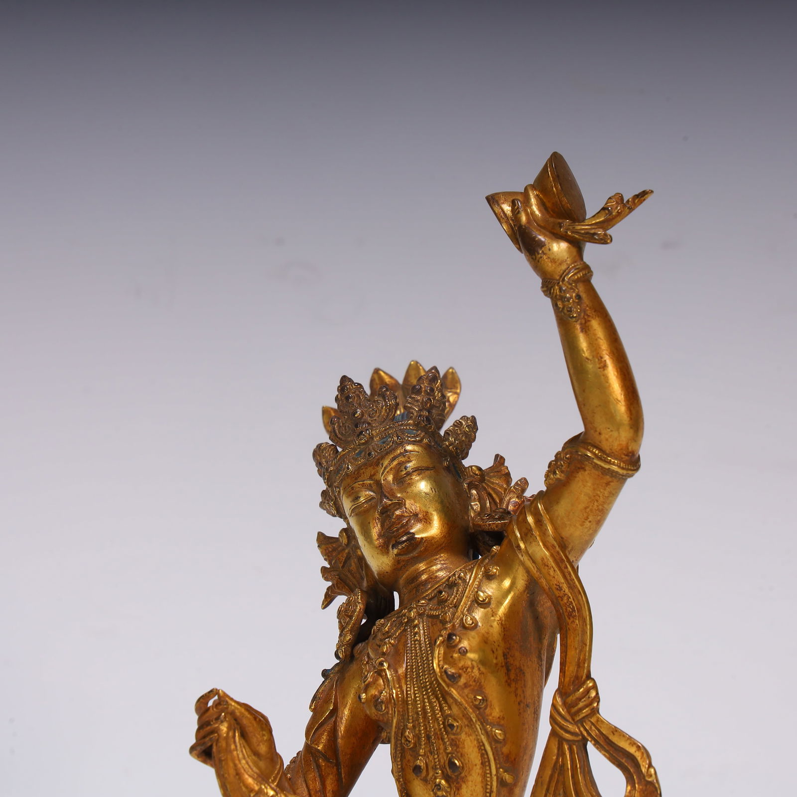 A fine copper gilt protector - 2