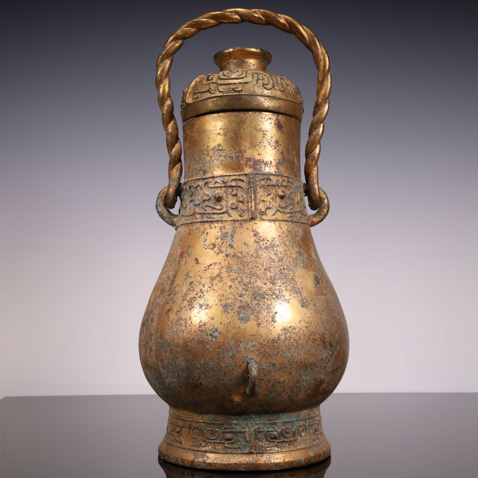 A copper-gilt beam pot of the Han Dynasty: The copper gilt beam pot of the Han Dynasty SIZE: L: D: 16.3cm W:cm H:36.2cm W:1.6kg (The Dimensions Of All Batches Are Manually Measured.If You Need More Detailed Information, Please Contact Our Cust