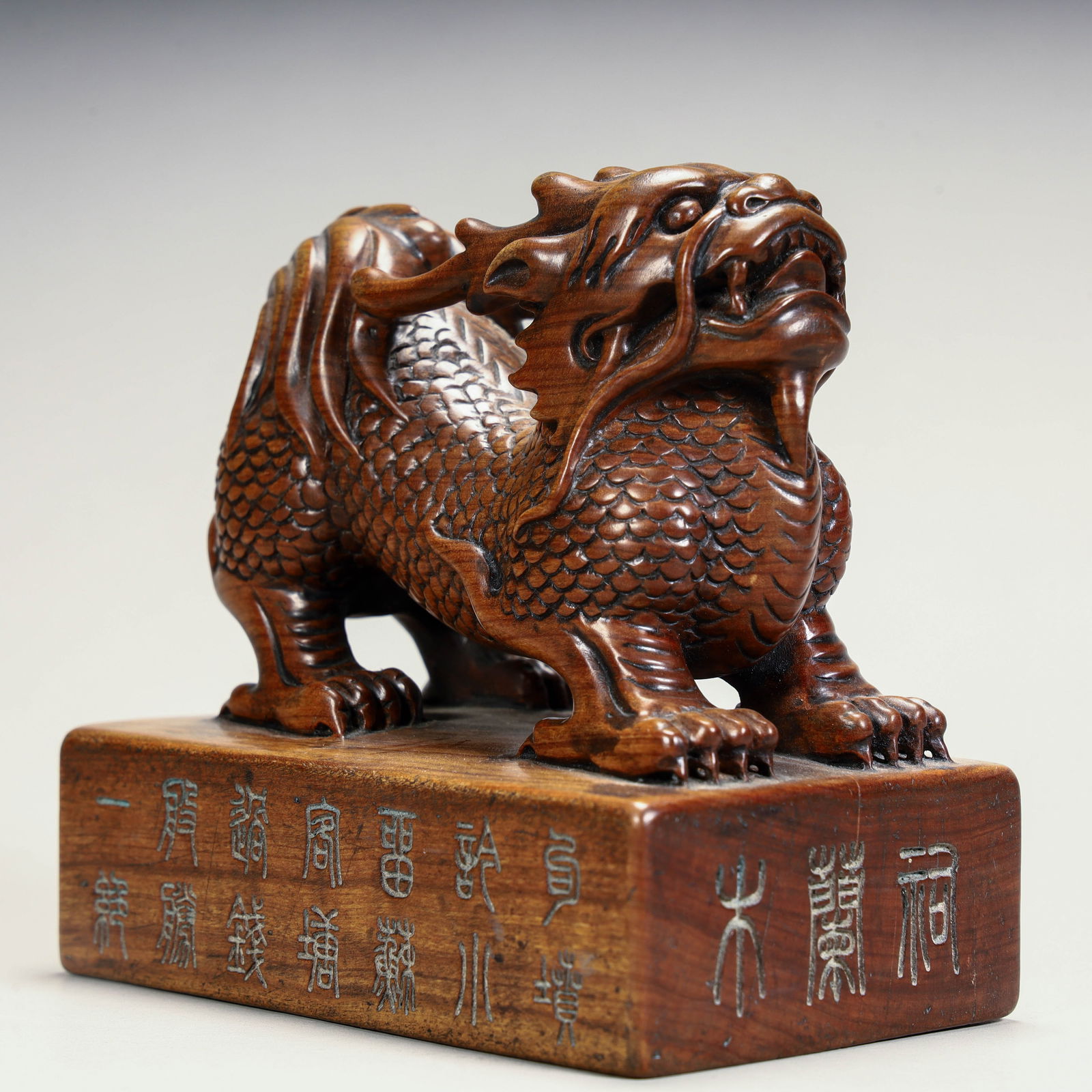 A Qing Dynasty boxwood carved unicorn button seal: Qing Dynasty boxwood carved unicorn button seal Size: H:10cm L: 10.5cm W:6.5cm W:363g (The Dimensions Of All Batches Are Manually Measured.If You Need More Detailed Information,