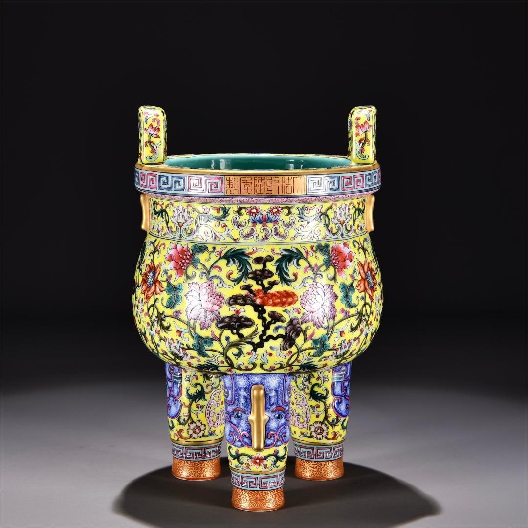 A yellow enamel colorful Ganoderma lucidum flower pattern tripod made in the Qianlong period of the: Qing Dynasty Qianlong year yellow enamel color Ganoderma lucidum flower pattern tripod Size:H:32cm W:20cm (The Dimensions Of All Batches Are Manually Measured.If You Need More