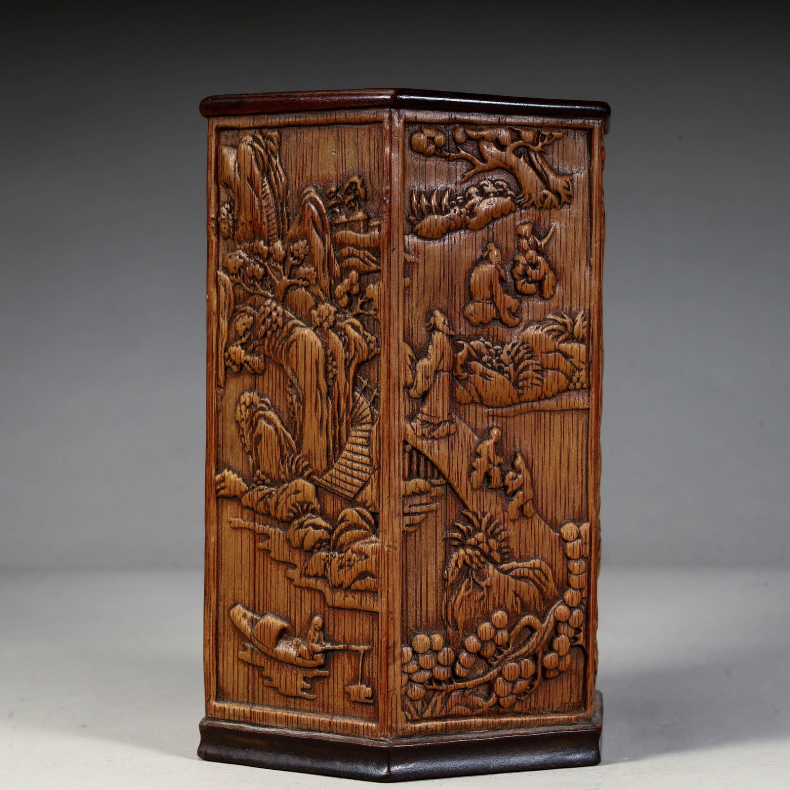 A hexagonal pen holder of bamboo carved landscape figures in the Qing Dynasty: Bamboo carved landscape figures of the Qing Dynasty hexagonal pen holder Size: H:15.4cm L:10.5cm W:9.4cm W:468g (The Dimensions Of All Batches Are Manually Measured.If You Need